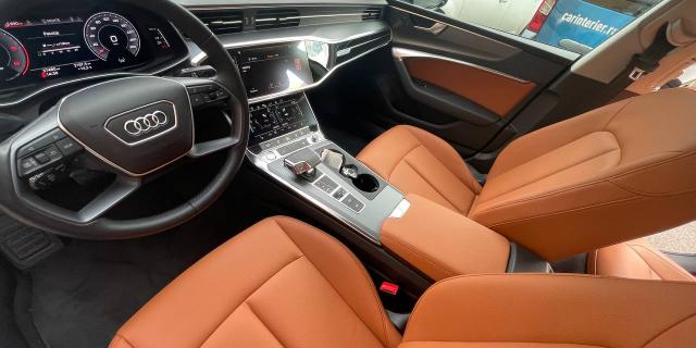 Audi A7. Перетяжка сидений, дверных вставок и центрального подлокотника